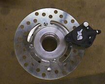 Front hub w/brake rotor and caliper